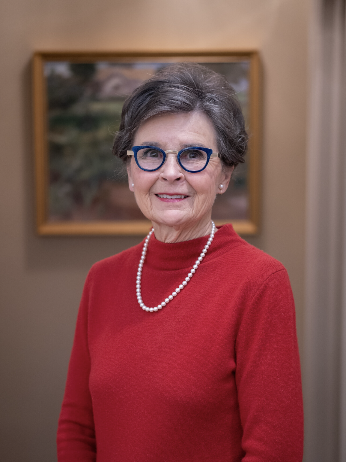 Professional portrait of a woman indoors, representing leaders in women-led philanthropy Topeka KS.